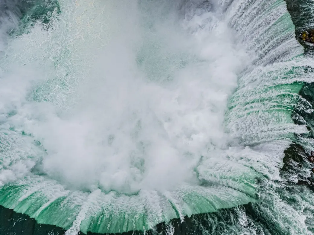 Aerial close-up of Horseshoe Falls from Table Rock with mist rising