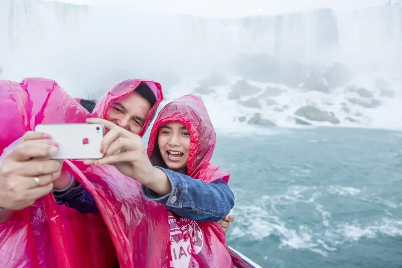 Father and daughter selfie with Niagara Falls in the background