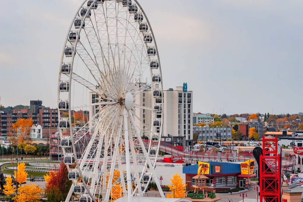 Niagara SkyWheel observation wheel with tourists enjoying panoramic views of Niagara Falls